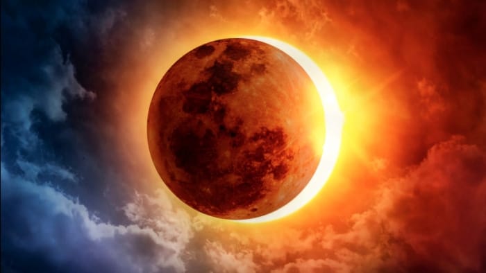 Hybrid solar eclipse with the new moon in Aries