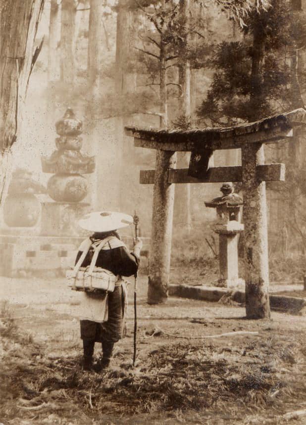 Japanese pilgrim arriving at a Shinto shrine
