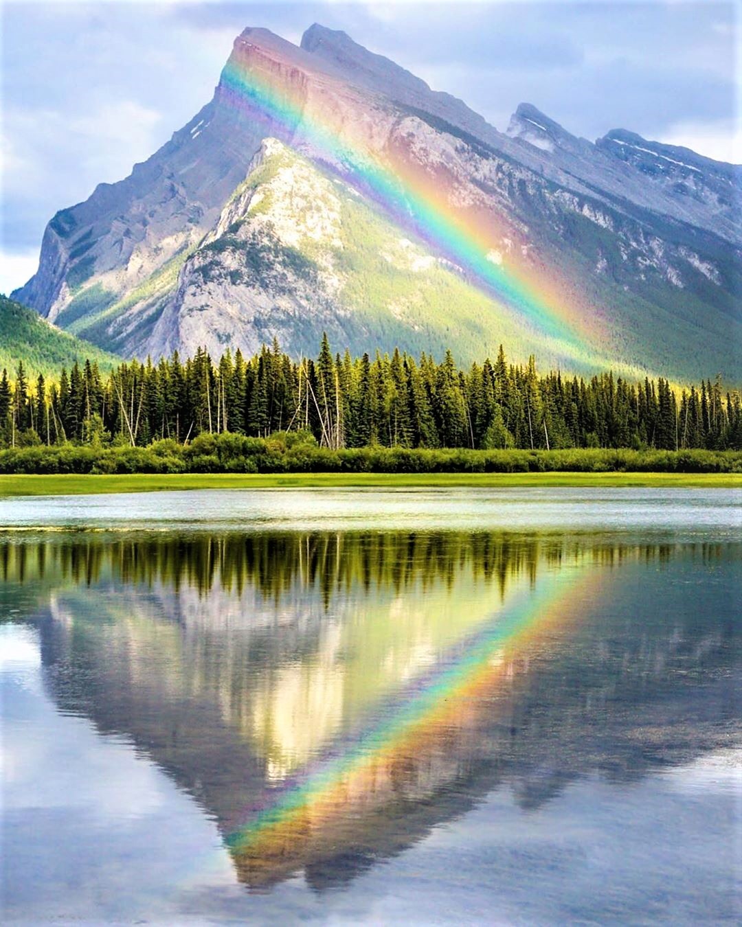 beautiful rainbow at Mount Rundle in Banff National Park, Canada 