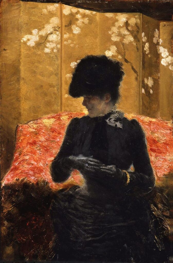 Lady on the red sofa