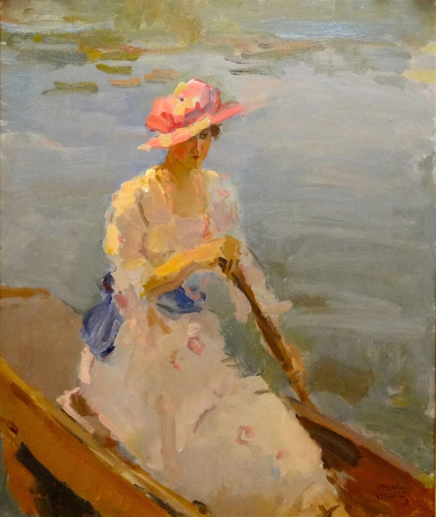 Young woman rowing on the Thames